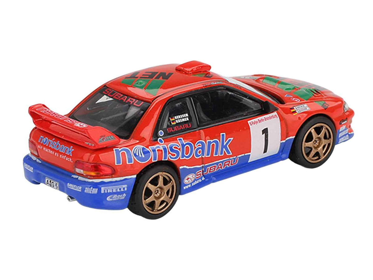 Mini GT Subaru Impreza WRC97 #1 diecast model car by Miniature Motors, depicting Armin Kremer and Fred Berssen at DRM 1999.