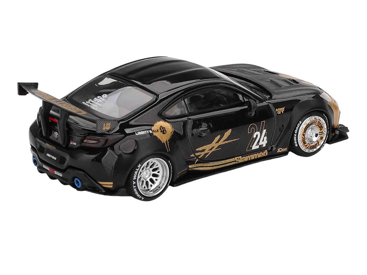 Mini GT Toyota GR86 LB-Nation Liberty Walk limited edition 1/64 diecast model car in black with carbon hood and gold graphics