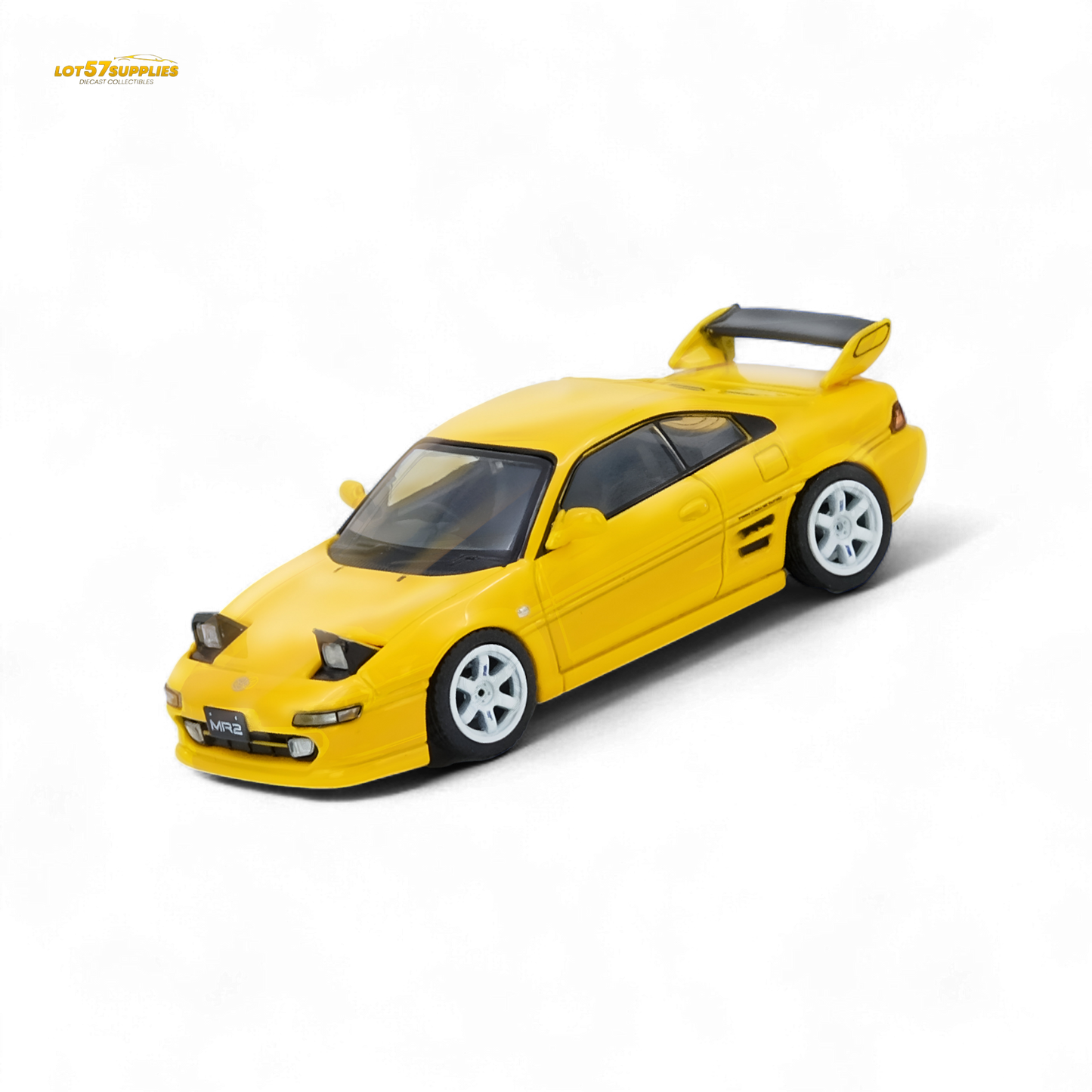 Yellow 1:64 scale Inno64 Toyota MR2 SW20 diecast model with detailed exterior, displayed on a plain background.