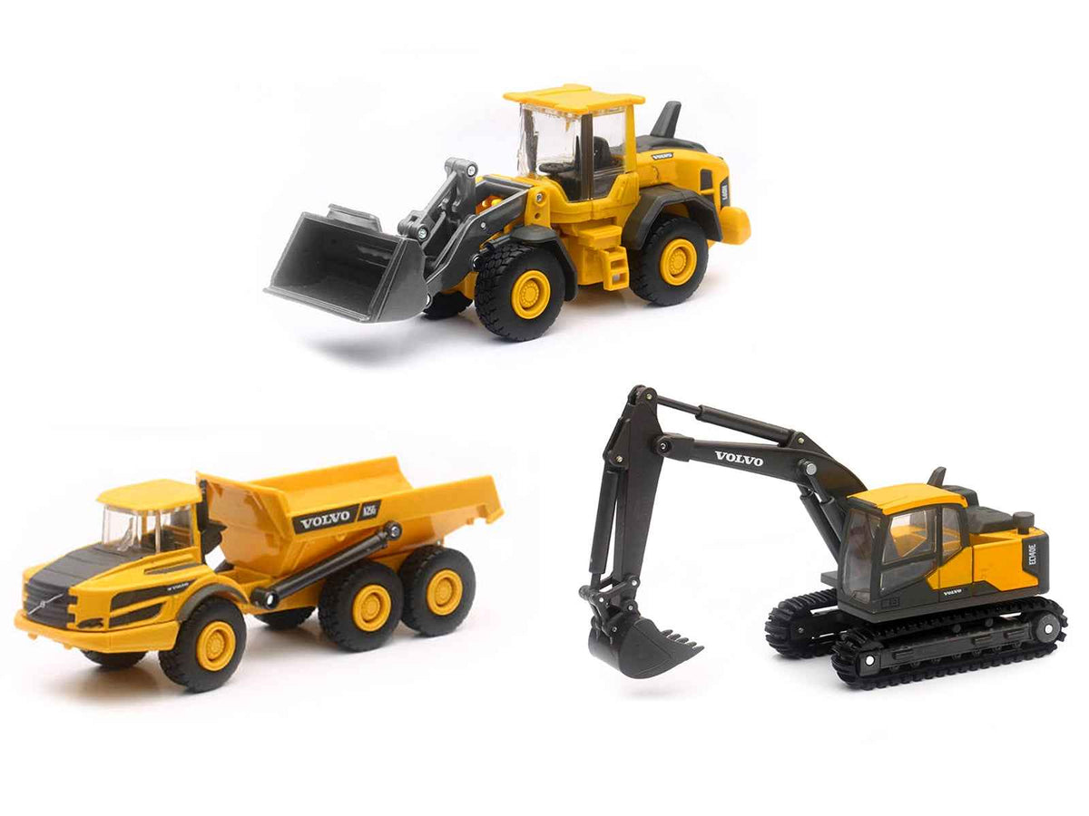 Set of three Volvo construction vehicle diecast models by Miniature Motors, featuring detailed miniature construction vehicles.