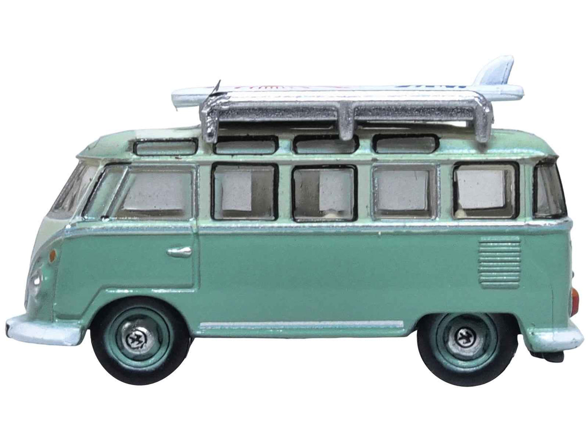 Miniature Motors Volkswagen T1 Samba Bus RHD diecast model in green two-tone with surfboards on roof rack, detailed 1/148 scale.