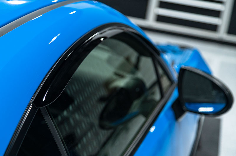 OLM V1 Style rain guards for 2022+ Subaru BRZ and Toyota GR86, shown installed on side windows