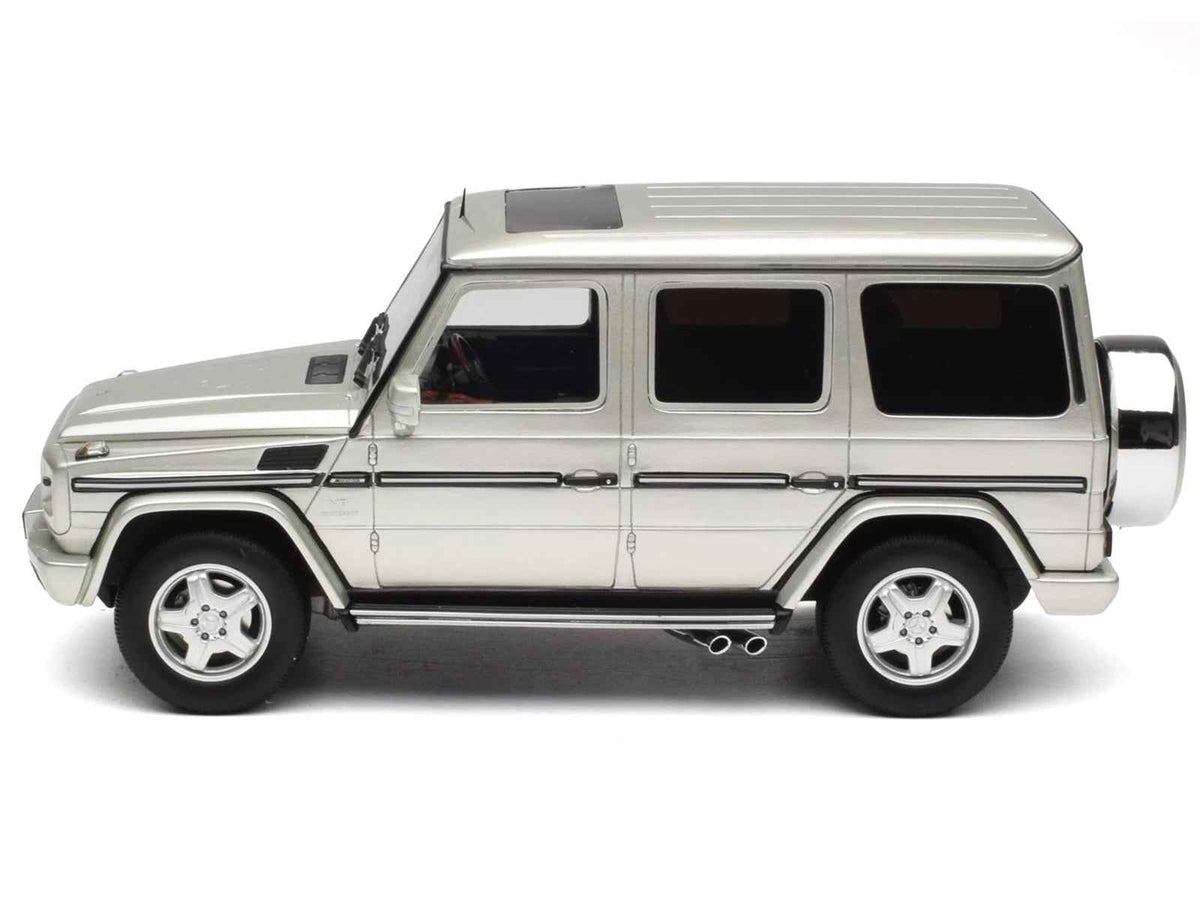 Miniature 2003 Mercedes-Benz G-Class 55 AMG model car in Iridium Silver Metallic by Otto Mobile, limited edition 1/18 scale.