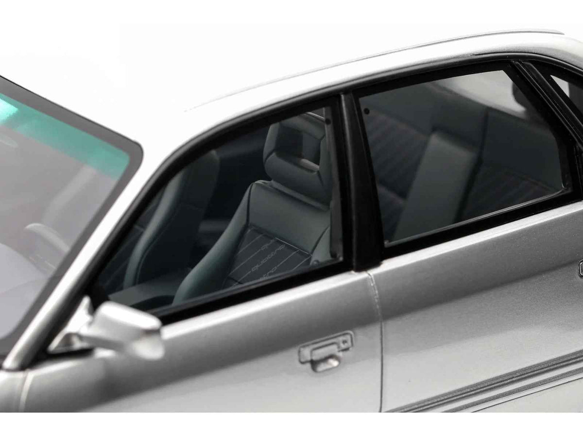 Miniature Audi S4 (C4) 4.2 V8 model car in Crystal Silver Metallic by Otto Mobile, limited edition 1/18 scale.