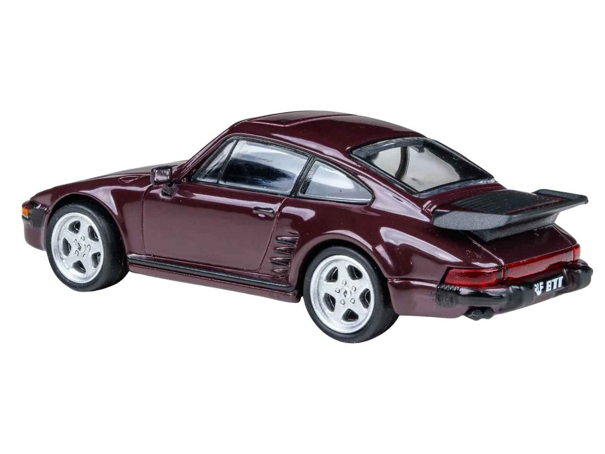 Ruby red metallic 1986 RUF BTR Slantnose diecast model car by Miniature Motors, detailed 1/64 scale collectible.