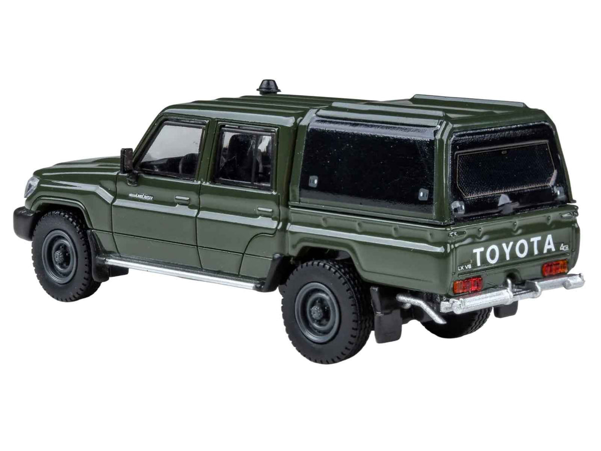 Miniature Toyota Land Cruiser LC 79 diecast model car with camper shell in military green by Paragon Models, 1/64 scale.