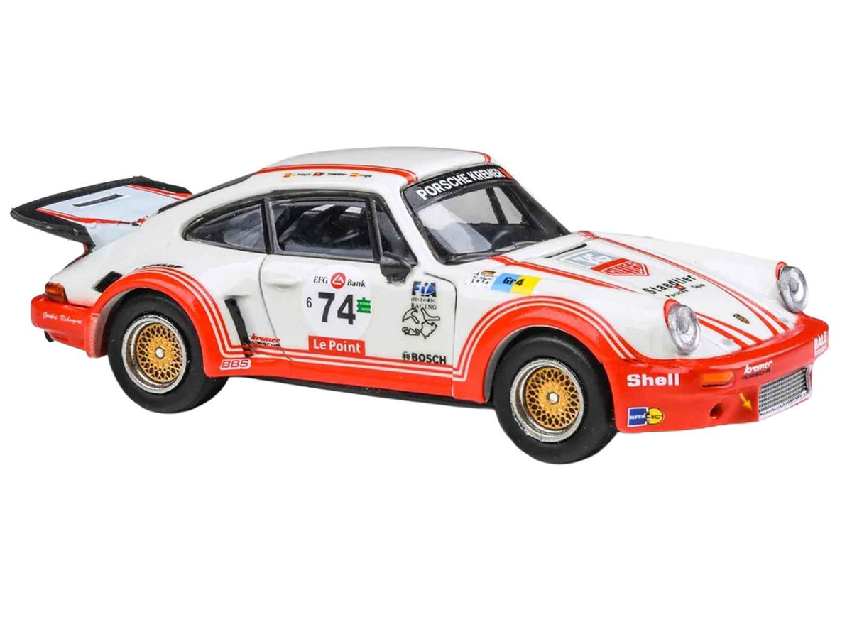 Miniature Motors Porsche 911 Carrera RSR 3.0 diecast model car, white with red stripes, 1/64 scale by Paragon Models.