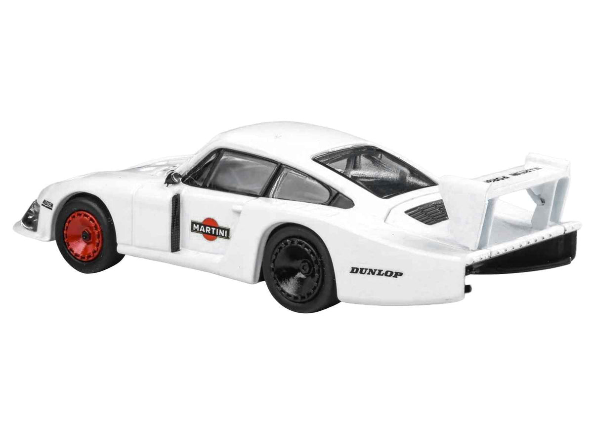 White Porsche 935/78 Moby Dick diecast model car by Miniature Motors, detailed 1/64 scale Porsche racing model with Martini Racing livery.