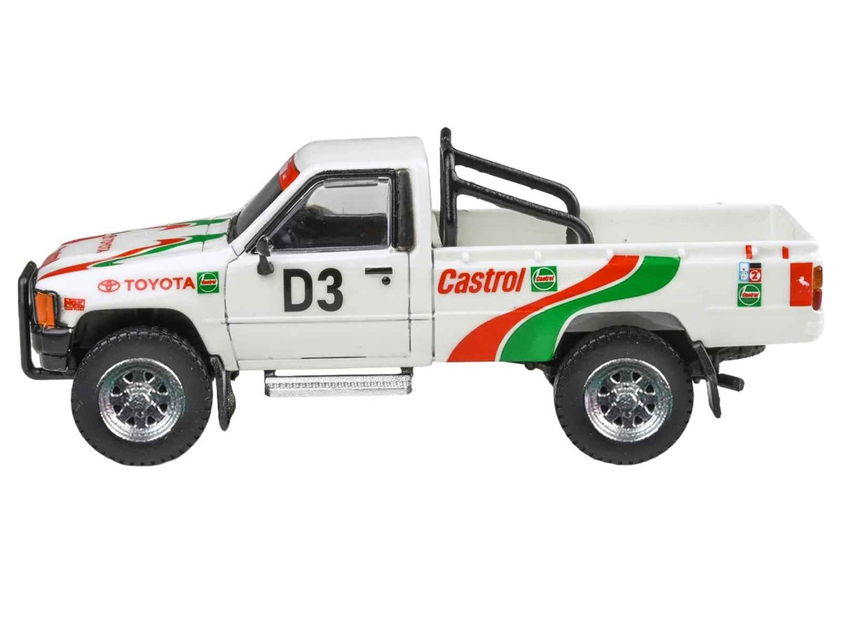 Miniature Toyota Hilux pickup truck diecast model by Miniature Motors, white with Rustenburg 400 Rally graphics, 1/64 scale.