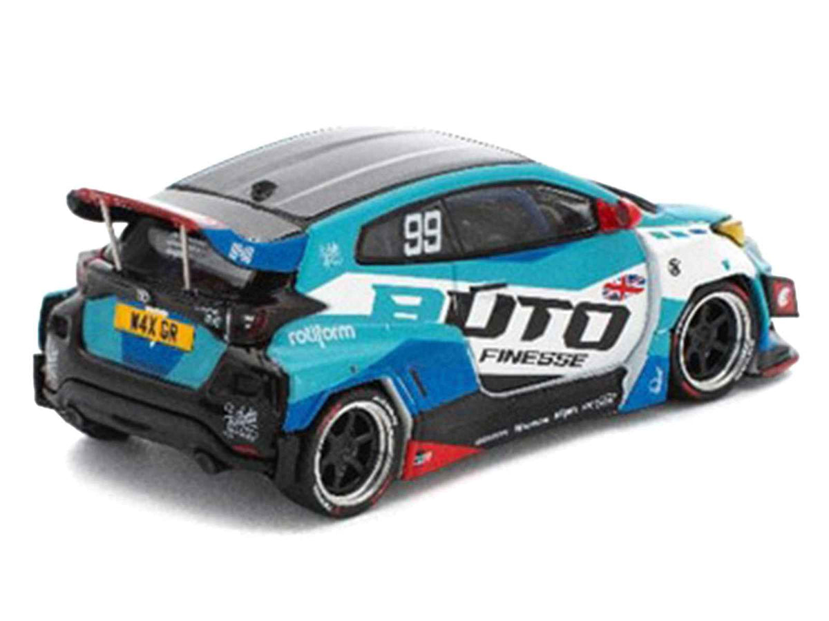 Miniature Motors Pandem GR Yaris RHD diecast model car in blue and white with graphics, part of Auto Finesse Enigma Edition, 1/64 scale.
