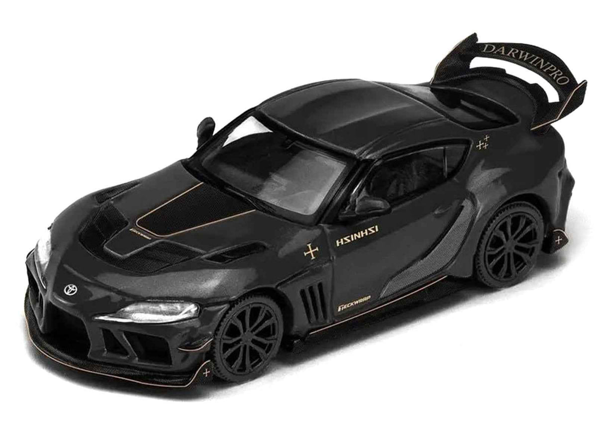 Miniature Motors Toyota Supra DarwinPro black diecast model car with gold accents, 1/64 scale, Enigma Exclusive Edition by Pop Race
