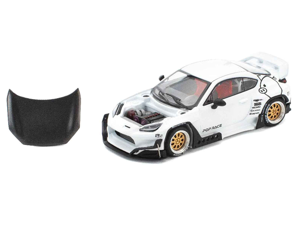 White Toyota Pandem GR86 diecast model car with carbon hood, Enigma Exclusive Edition, by Miniature Motors, 1/64 scale.