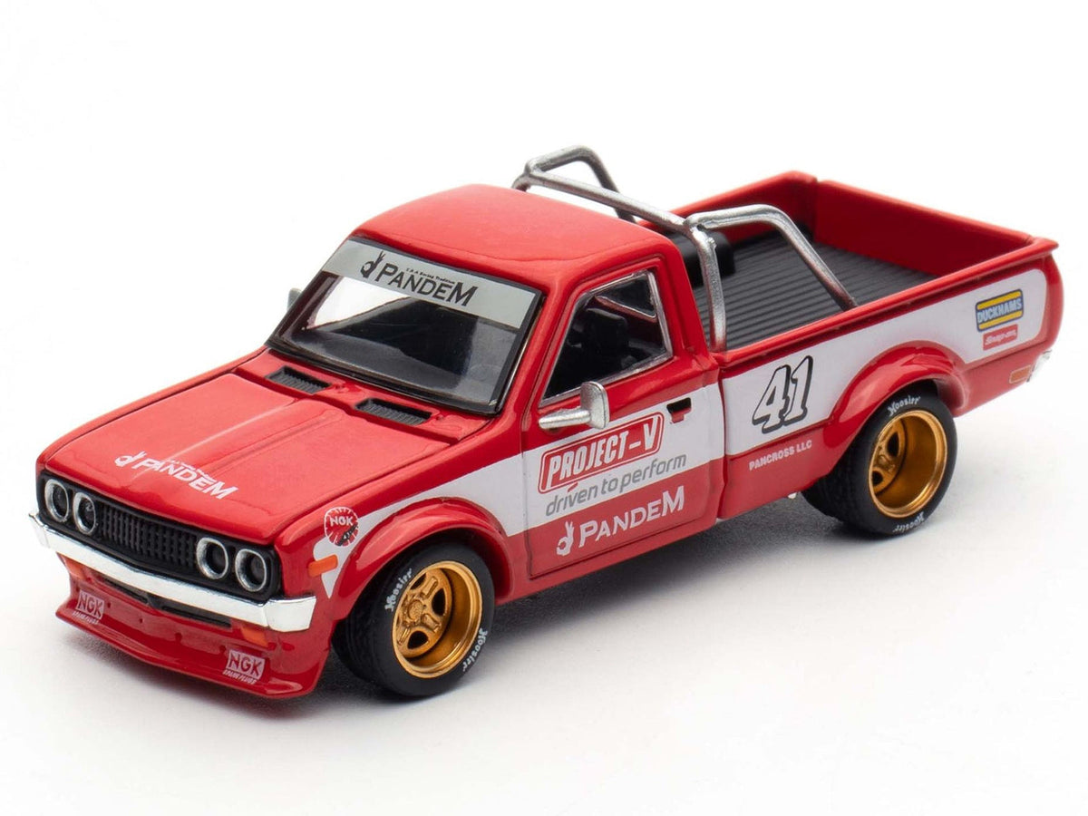 Red metallic Datsun Pandem 620 pickup truck diecast model by Miniature Motors with white stripes and graphics, 1/64 scale.