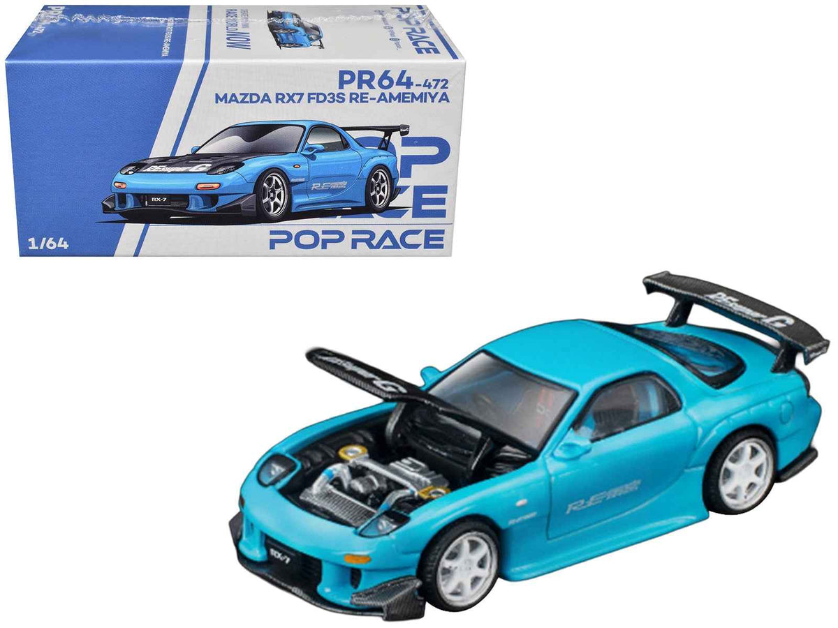 Miniature Motors Mazda RX7 FD3S RE Amemiya diecast model car in light blue with carbon hood, RHD, at Tokyo Auto Salon 2026, 1/64 scale