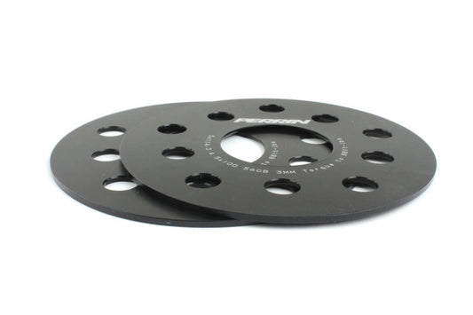 JDMuscle black 3mm wheel spacers for Subaru WRX, STI, Outback, Legacy, and Forester models, shown installed on the vehicle.