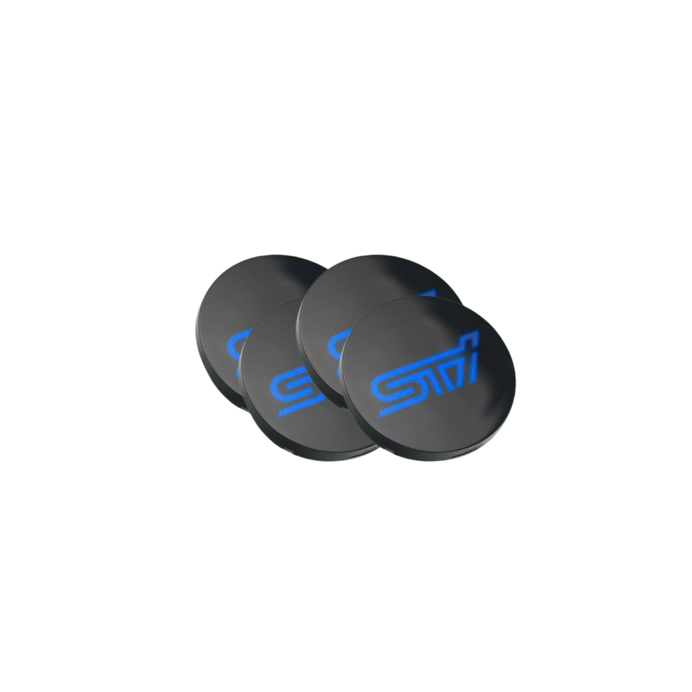 Subaru WRX/STI factory wheel center caps with Racing Art logo in red, blue, neon yellow, and white for Subaru wheels.