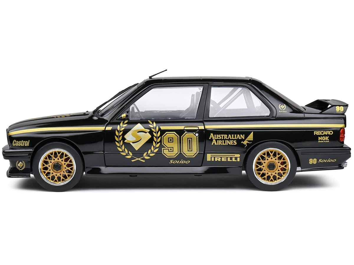 Black 1990 BMW E30 M3 diecast model car in Solido 90th Anniversary Competition series, detailed miniature by Miniature Motors.