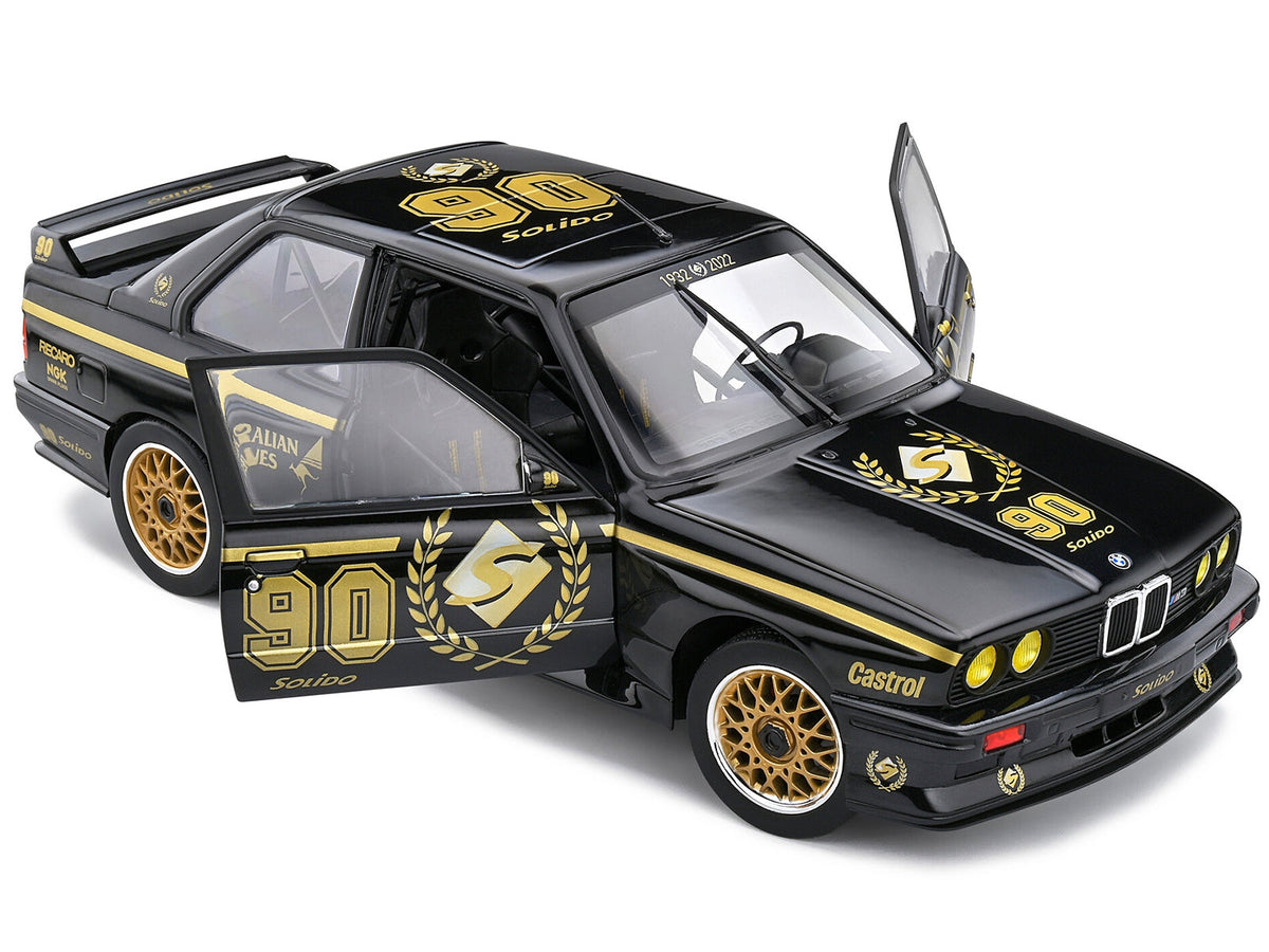 Black 1990 BMW E30 M3 diecast model car by Solido, limited edition "Solido 90th Anniversary" Competition series, 1/18 scale.