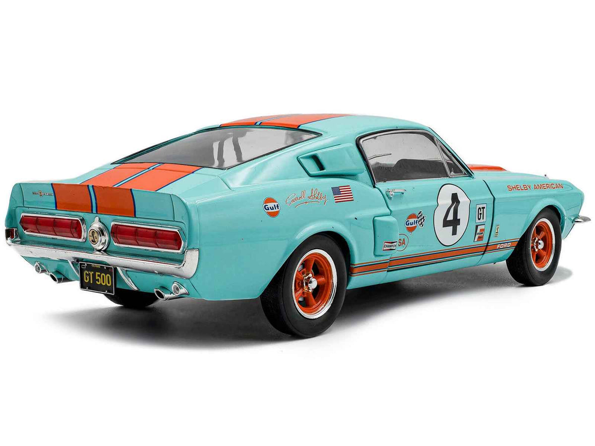 Light blue 1967 Shelby GT500 #4 Gulf Racing Tribute diecast model car by Miniature Motors, featuring orange stripes.
