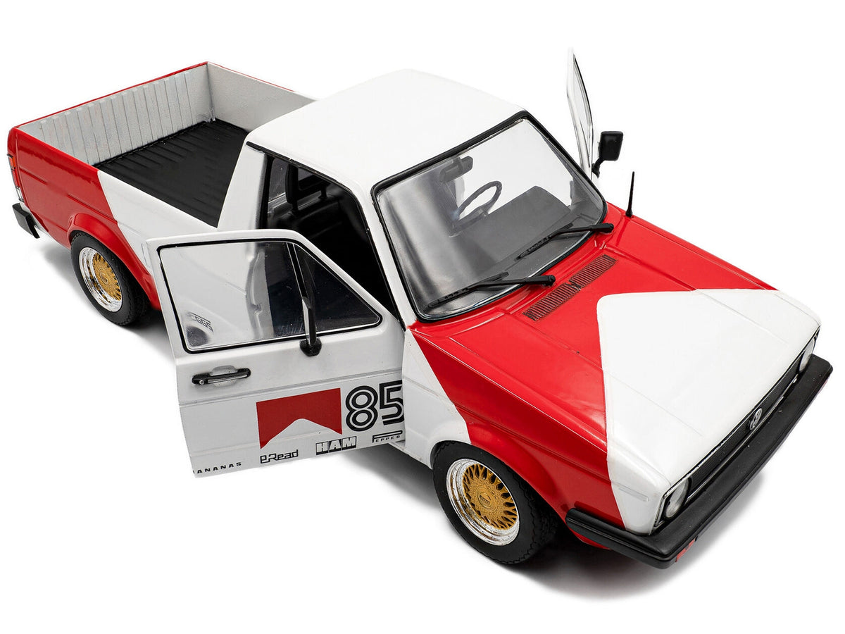 1983 Volkswagen Caddy MK 1 Pickup Truck diecast model by Solido, red and white "Red Cowboy Racing Tribute" miniature car.