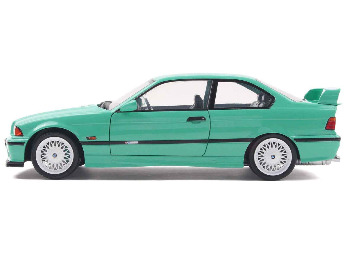 Mint green 1991 BMW E36 M3 diecast model car by Solido, detailed 1/18 scale with matching mint green interior.