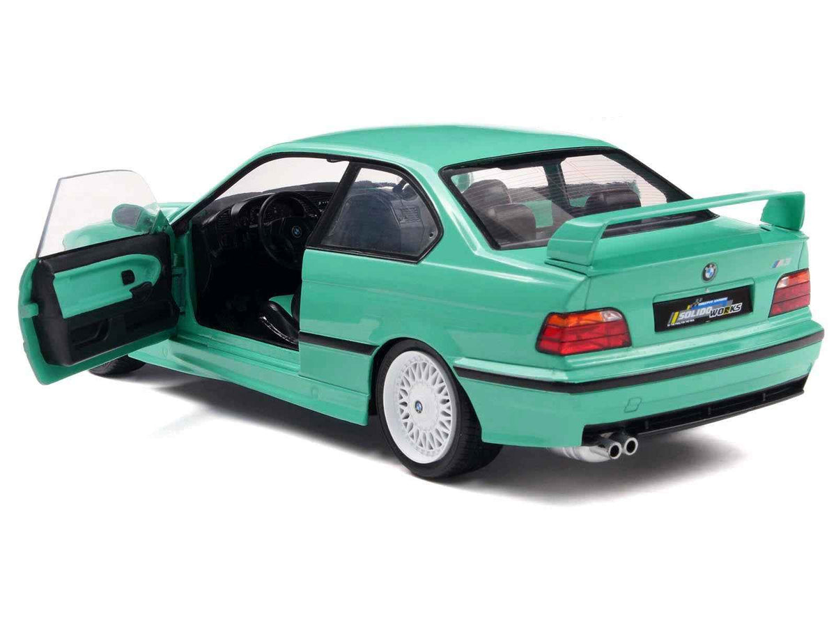 Mint green 1991 BMW E36 M3 diecast model car by Solido, featuring detailed interior and realistic exterior details.