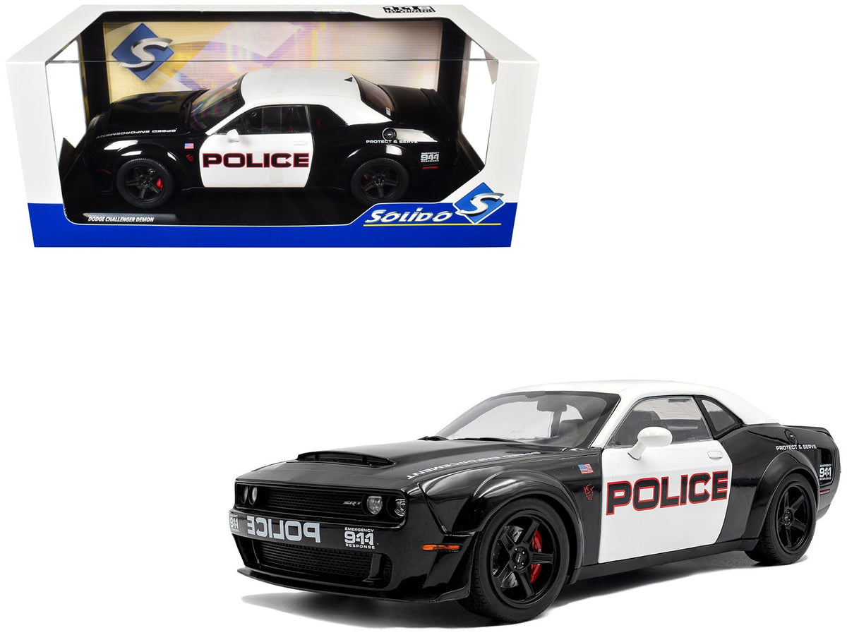 Black and white 2023 Dodge Challenger Demon police diecast model car by Solido, detailed miniature Dodge vehicle in 1/18 scale.