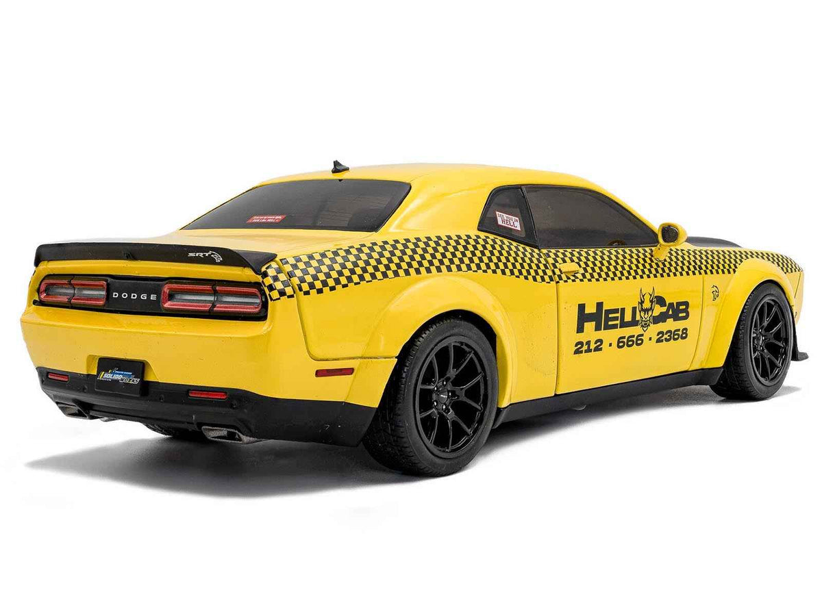 Yellow 2023 Dodge Challenger SRT Hellcat Redeye Widebody NYC Hellcab diecast model car with black hood and graphics by Solido.