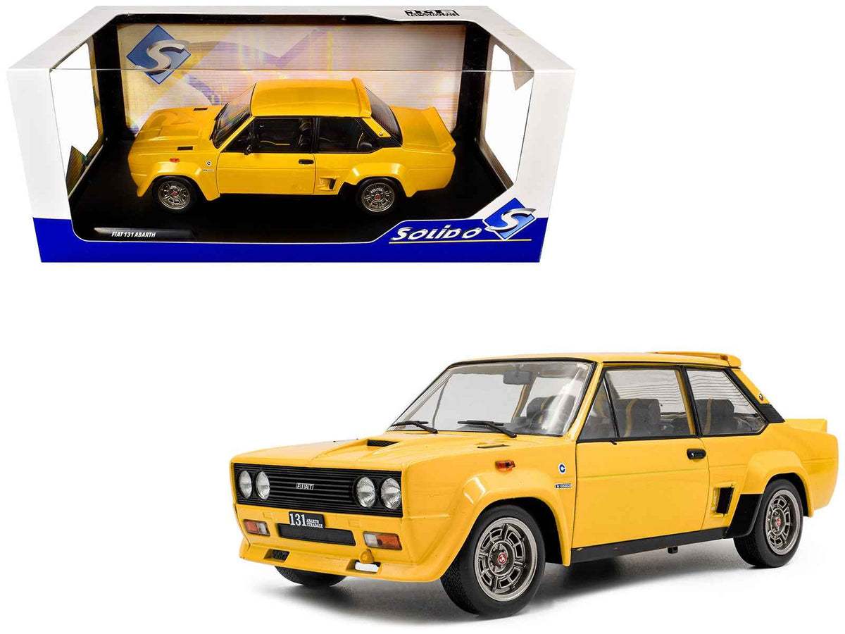 Yellow 1980 Fiat 131 Abarth 1/18 diecast model car by Solido, detailed miniature collectible from Miniature Motors.