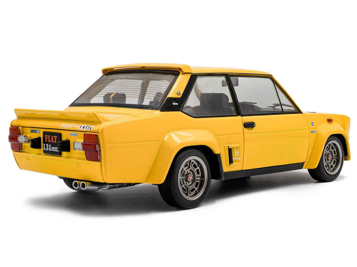 Yellow 1/18 scale Fiat 131 Abarth diecast model car by Solido, detailed miniature replica from Fiat models collection.