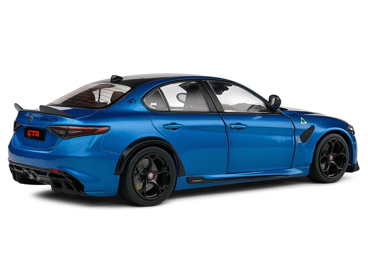 2022 Alfa Romeo Giulia GTA anodized blue metallic 1/18 diecast model car by Solido, featuring carbon top and detailed design.