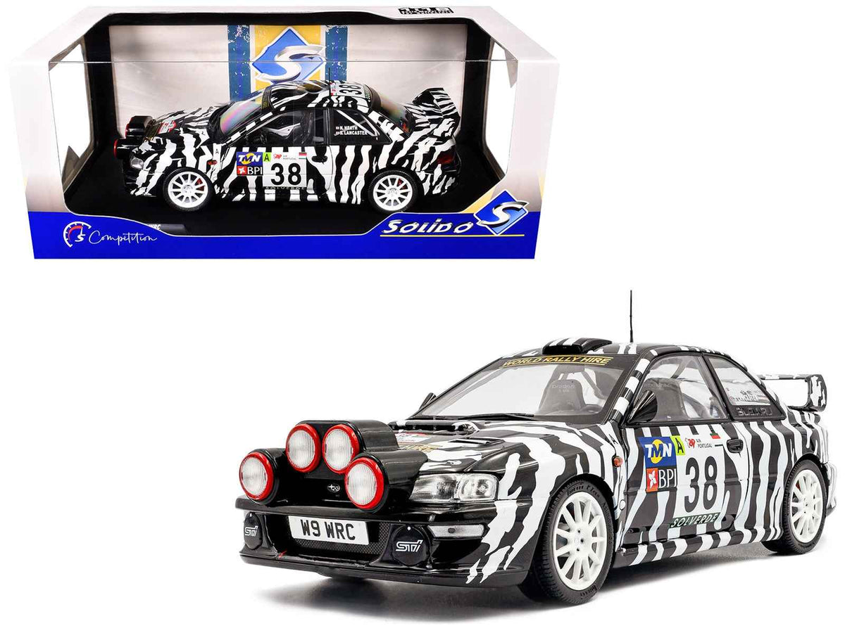 Miniature Motors Subaru Impreza WRC99 #38 rally car diecast model by Solido, showcasing Nigel Heath and Steve Lancaster at Portugal rally.