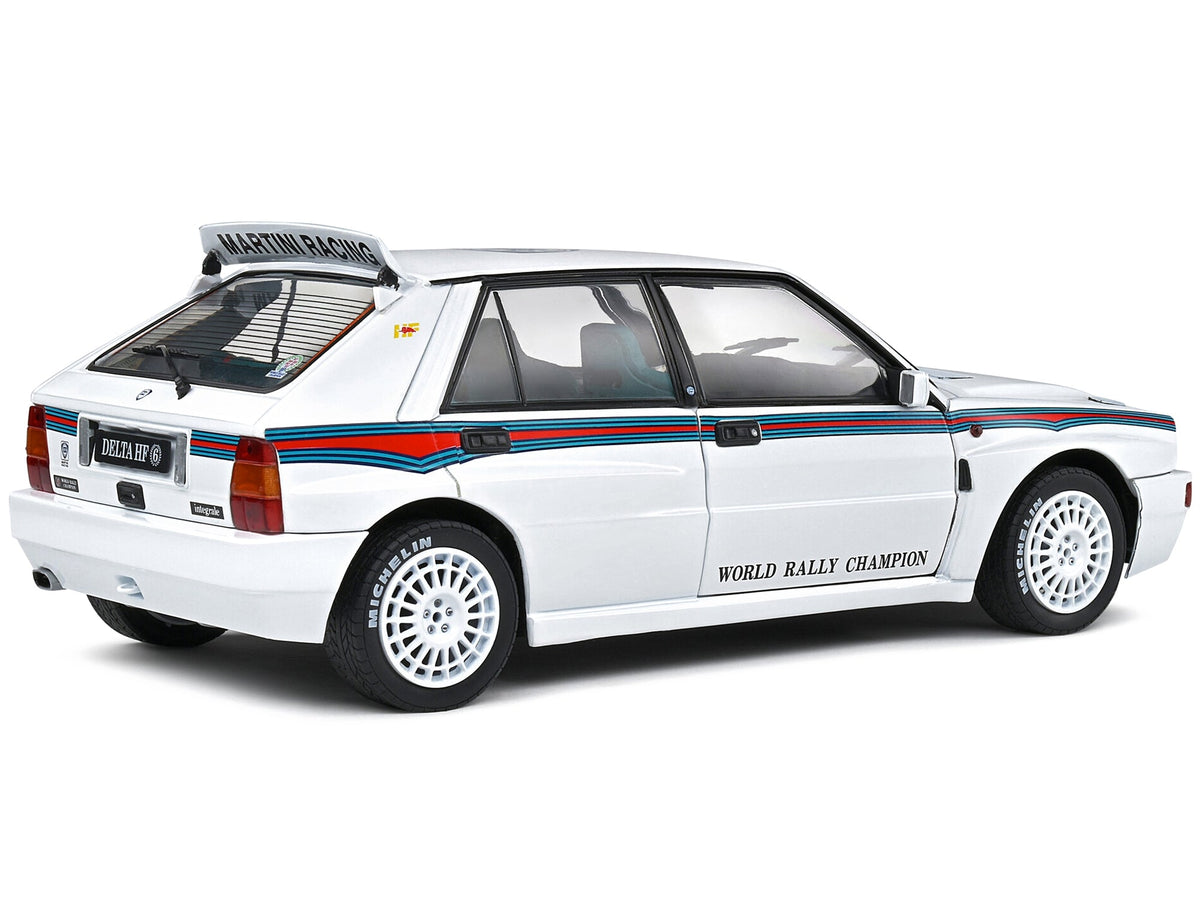 Miniature Motors 1/18 diecast model of 1992 Lancia Delta HF Integrale Evo 1 Martini racing car in white with blue and red stripes.