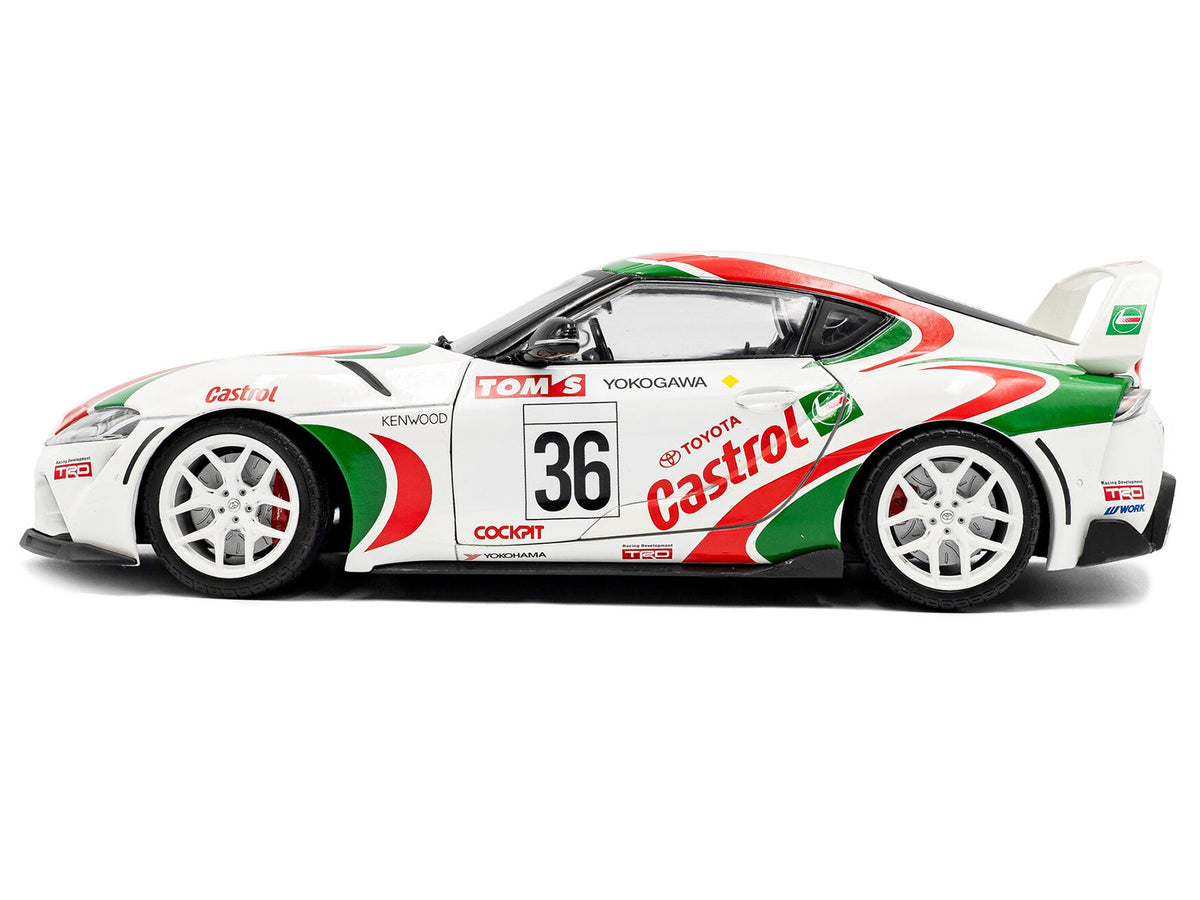 2024 Toyota GR Supra #36 diecast model car by Solido, white with green and red racing graphics, detailed miniature Toyota model.