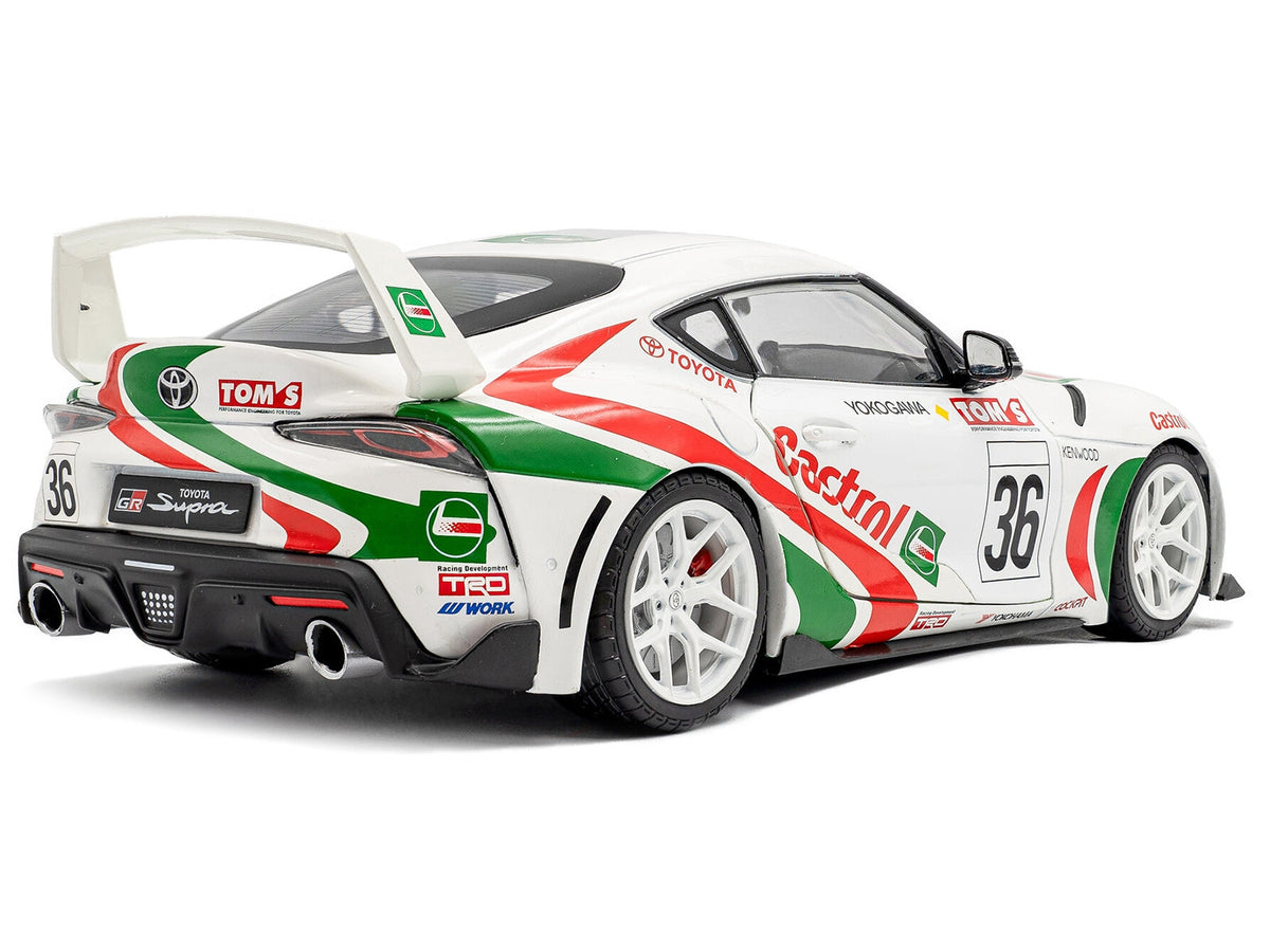 2024 Toyota GR Supra #36 diecast model car by Solido, white with green and red racing graphics, detailed miniature Toyota vehicle.