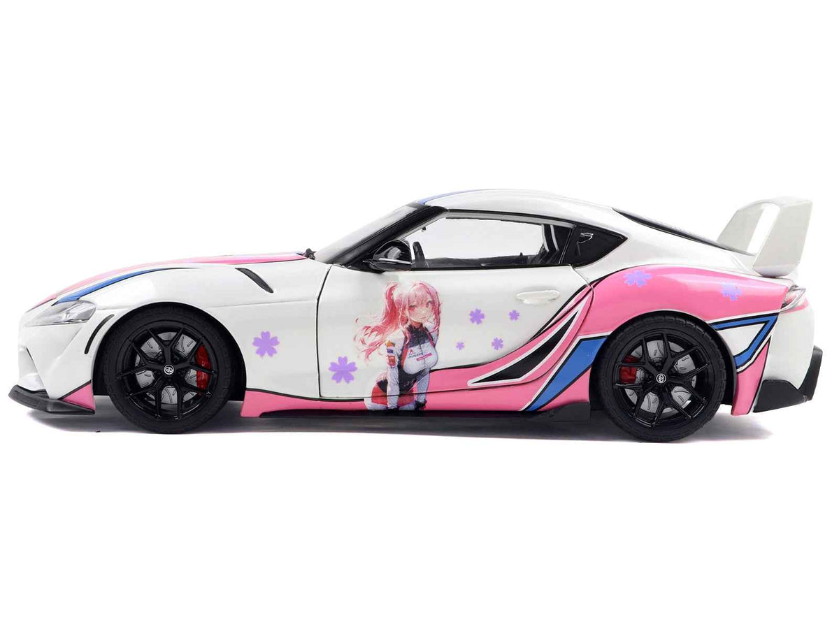 2024 Toyota GR Supra itasha diecast model car in white with StreetFighters graphics by Solido, 1/18 scale, detailed miniature vehicle.
