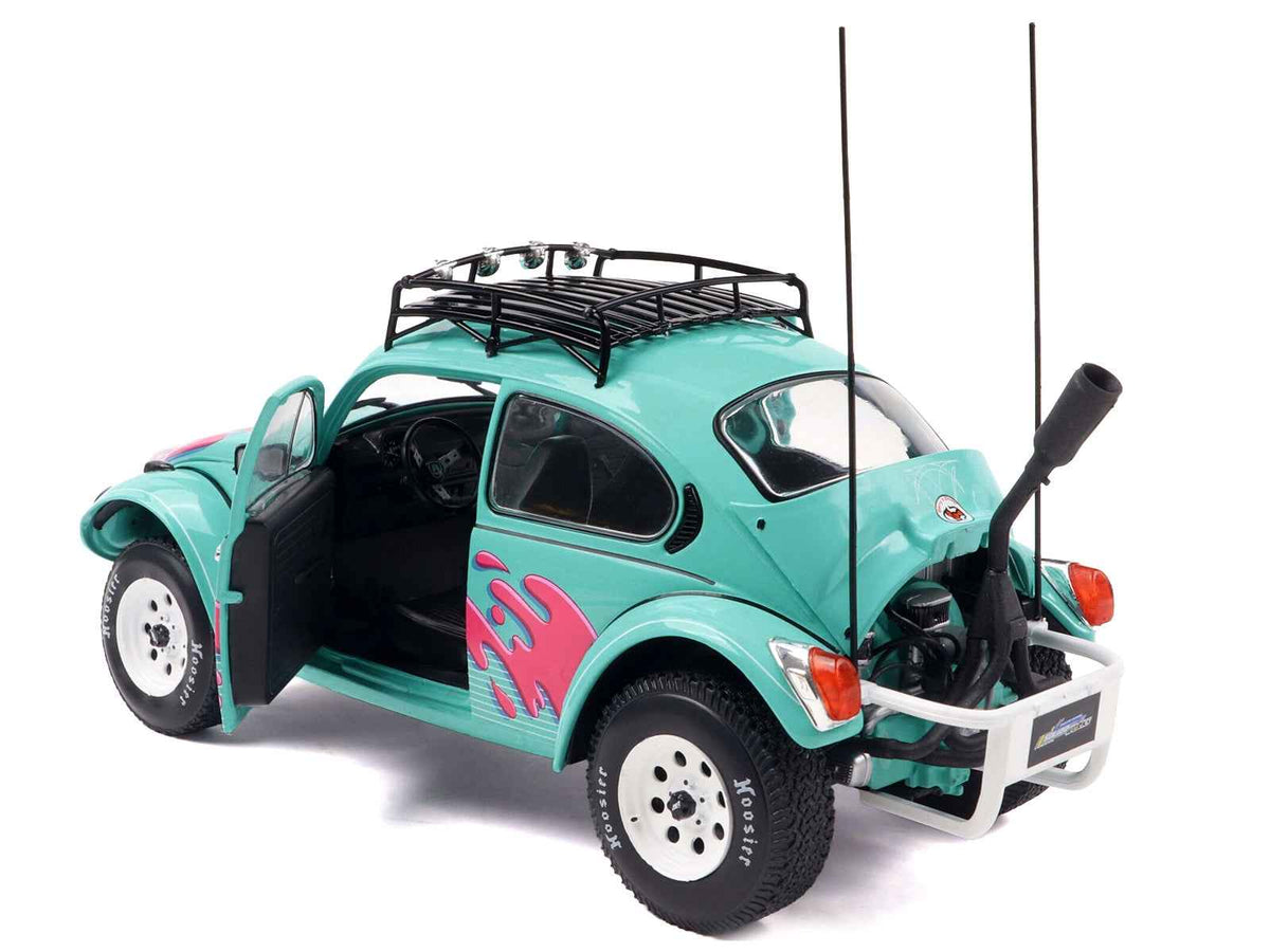 Miniature Motors 1/18 Volkswagen Beetle Baja diecast model in Miami Green with pink graphics by Solido, detailed collectible car.