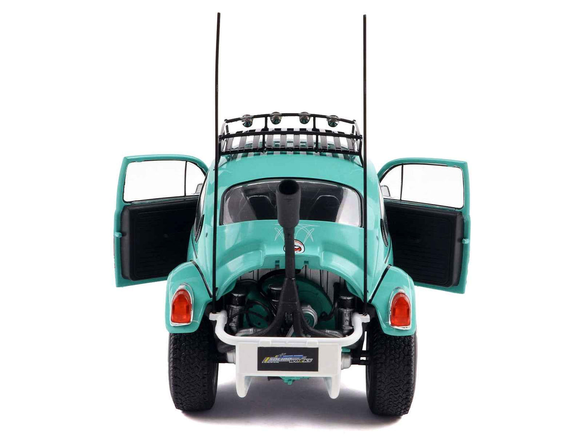 Miniature Motors 1/18 diecast Volkswagen Beetle Baja model in Miami Green with pink graphics, detailed collectible car by Solido