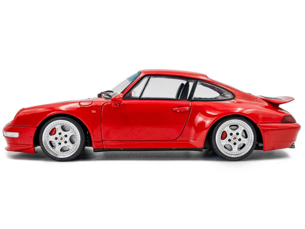 Miniature Motors 1/18 scale Porsche 911 (993) Carrera RS diecast model car in Guards Red by Solido, detailed collectible display piece.