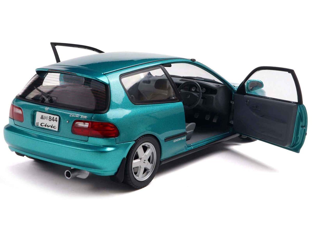 1991 Honda Civic EG6 RHD diecast model car in Aztec Green Metallic by Solido, detailed miniature Honda model on white background.
