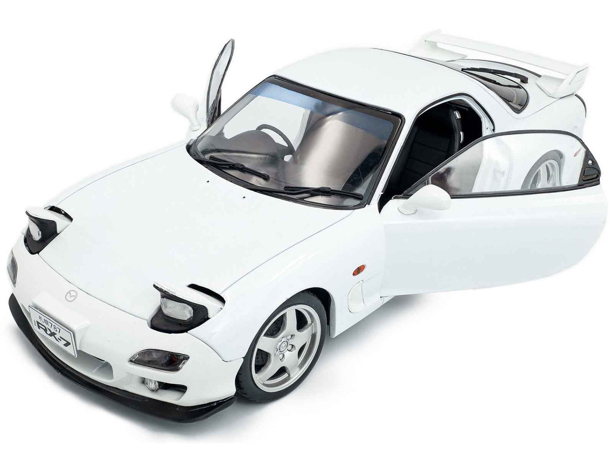 White 2001 Mazda RX7 Type RS (FD3S) RHD diecast model car by Solido, detailed 1/18 scale Mazda model from Miniature Motors.