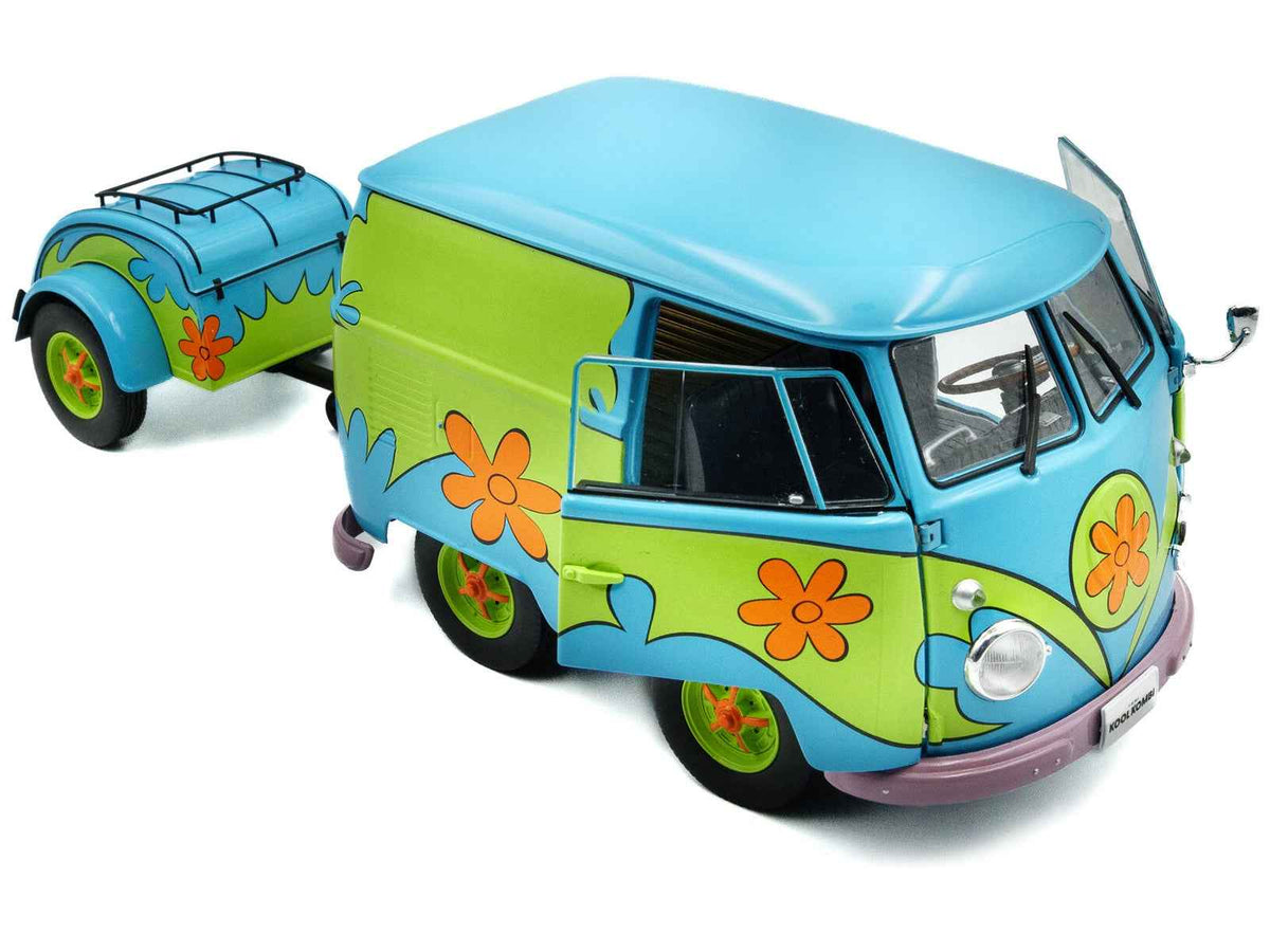 2024 Volkswagen Kool Kombi Van with trailer, blue and green ghost hunter graphics, 1/18 diecast model by Solido, detailed miniature vehicle