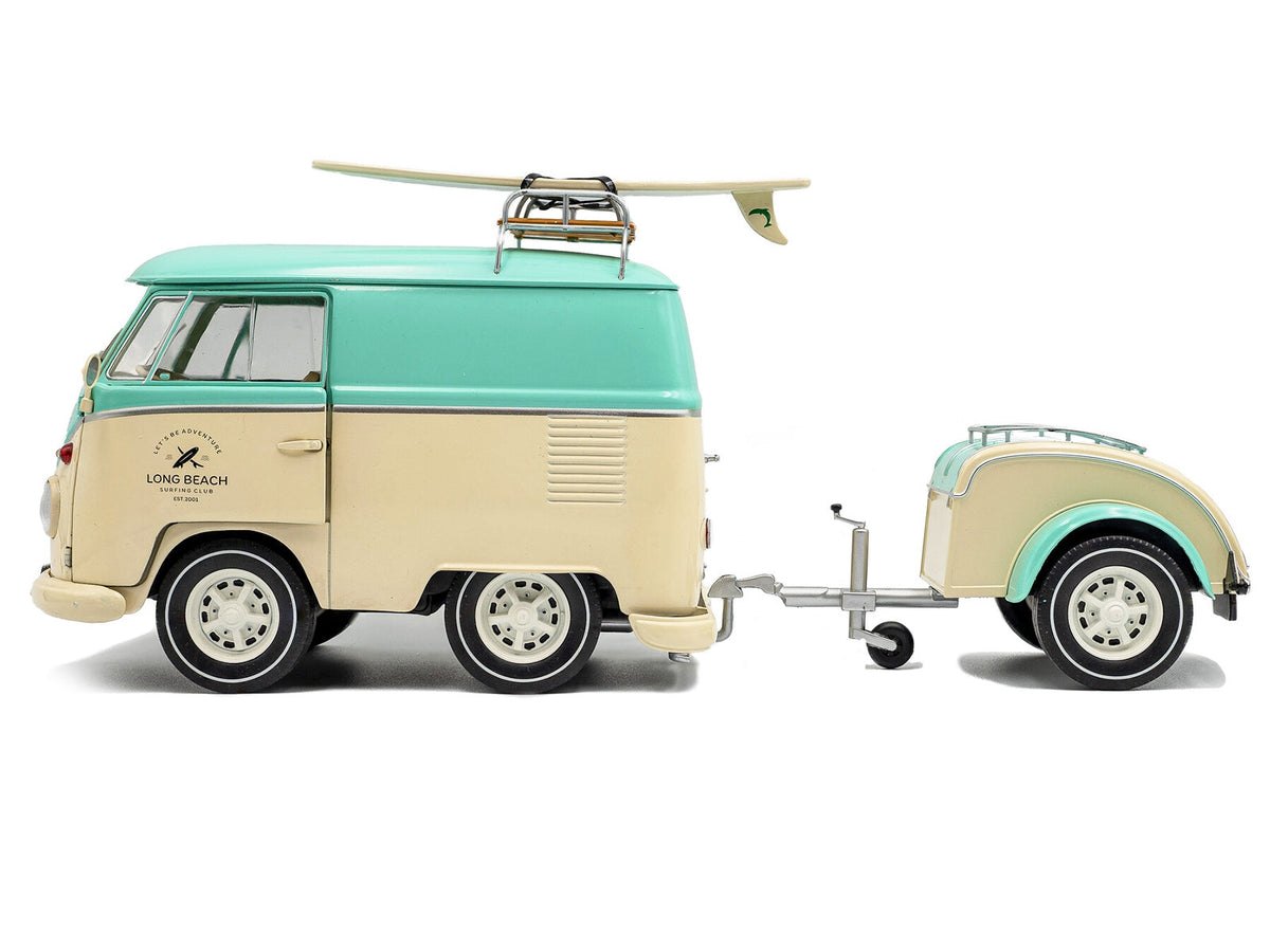 Mint green and cream 2024 Volkswagen Cool Combi van with trailer, roof rack, and surfboard, detailed 1/18 diecast model by Solido.