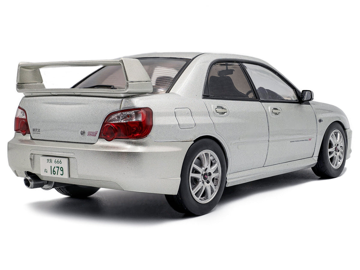 Silver 2004 Subaru Impreza WRX STI RHD 1/18 diecast model car by Miniature Motors, detailed Subaru models by Solido.