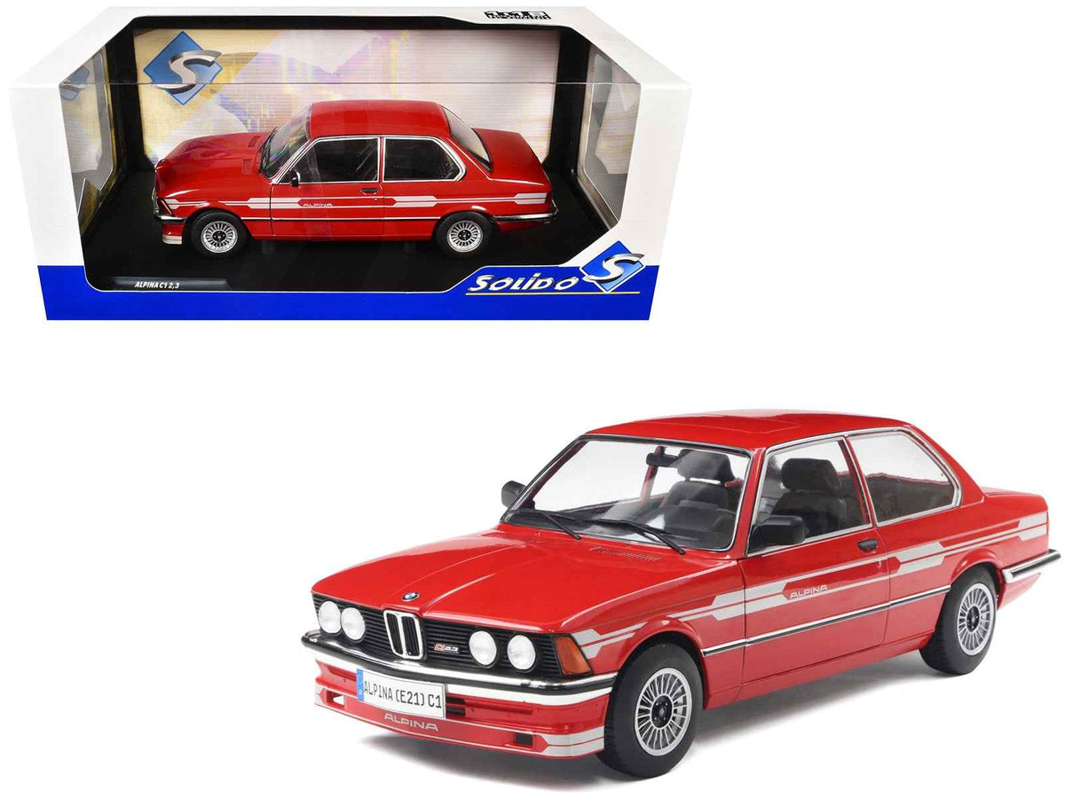 Red Alpina E21 C1 2.3 diecast model car with gray stripes, 1/18 scale by Solido, detailed miniature vehicle.