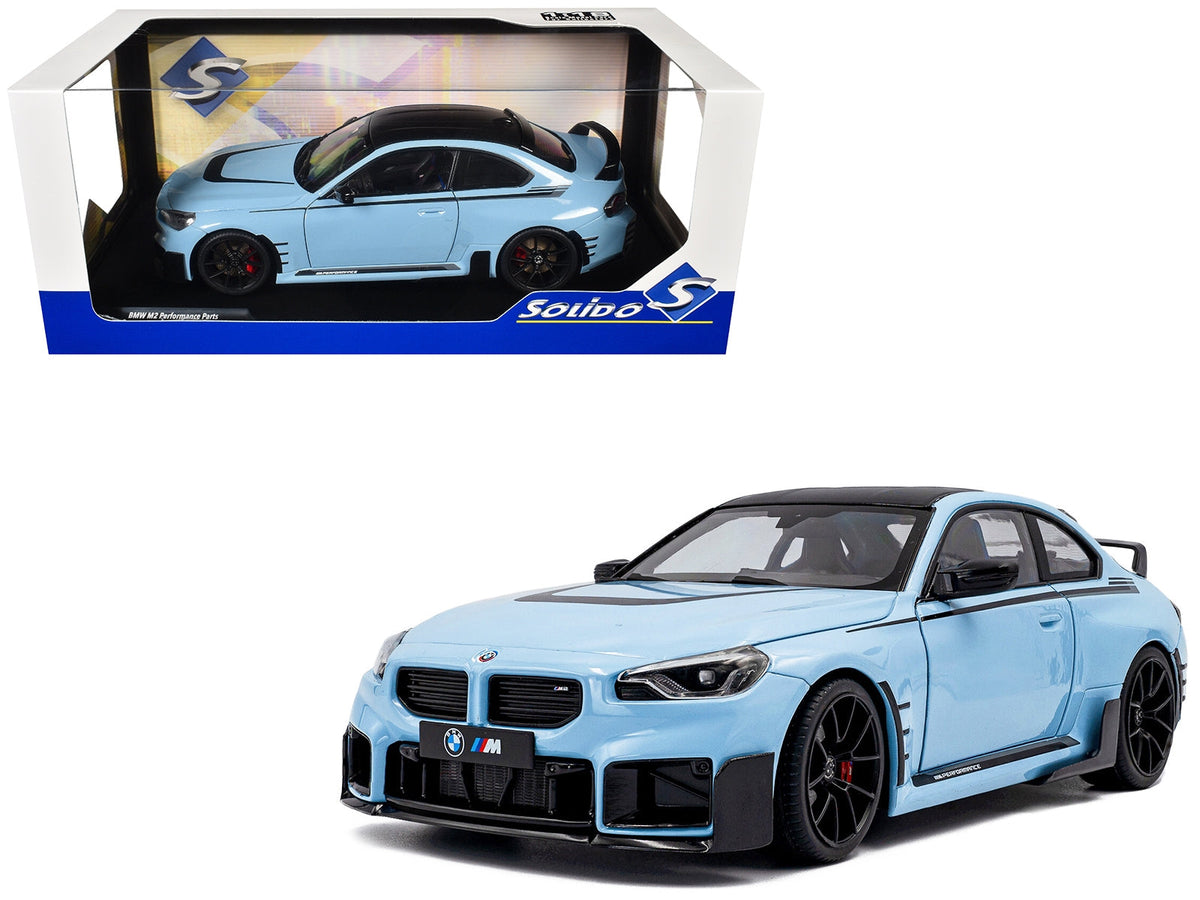 2024 BMW M2 diecast model by Solido in Zandvoort Blue with carbon top and black stripes, detailed miniature car.