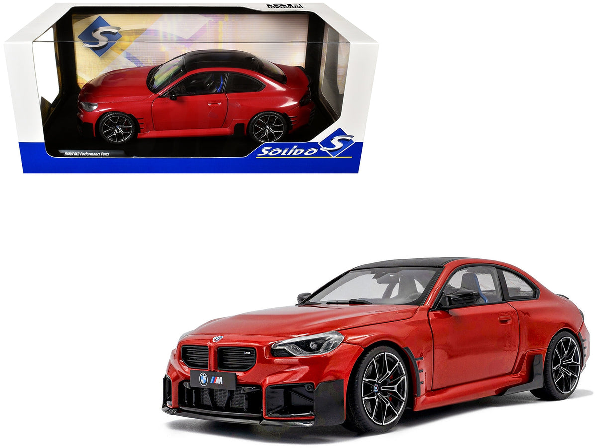 2024 BMW M2 diecast model car by Solido, Toronto Red Metallic with carbon fiber top, 1/18 scale miniature vehicle.