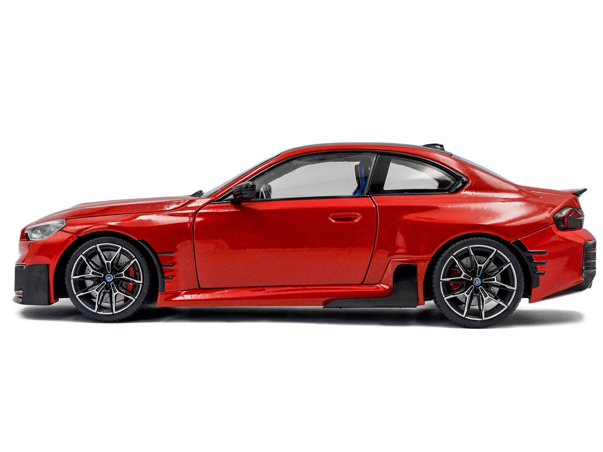 2024 BMW M2 miniature diecast model car by Solido, Toronto Red Metallic with carbon top, detailed 1/18 scale BMW model.