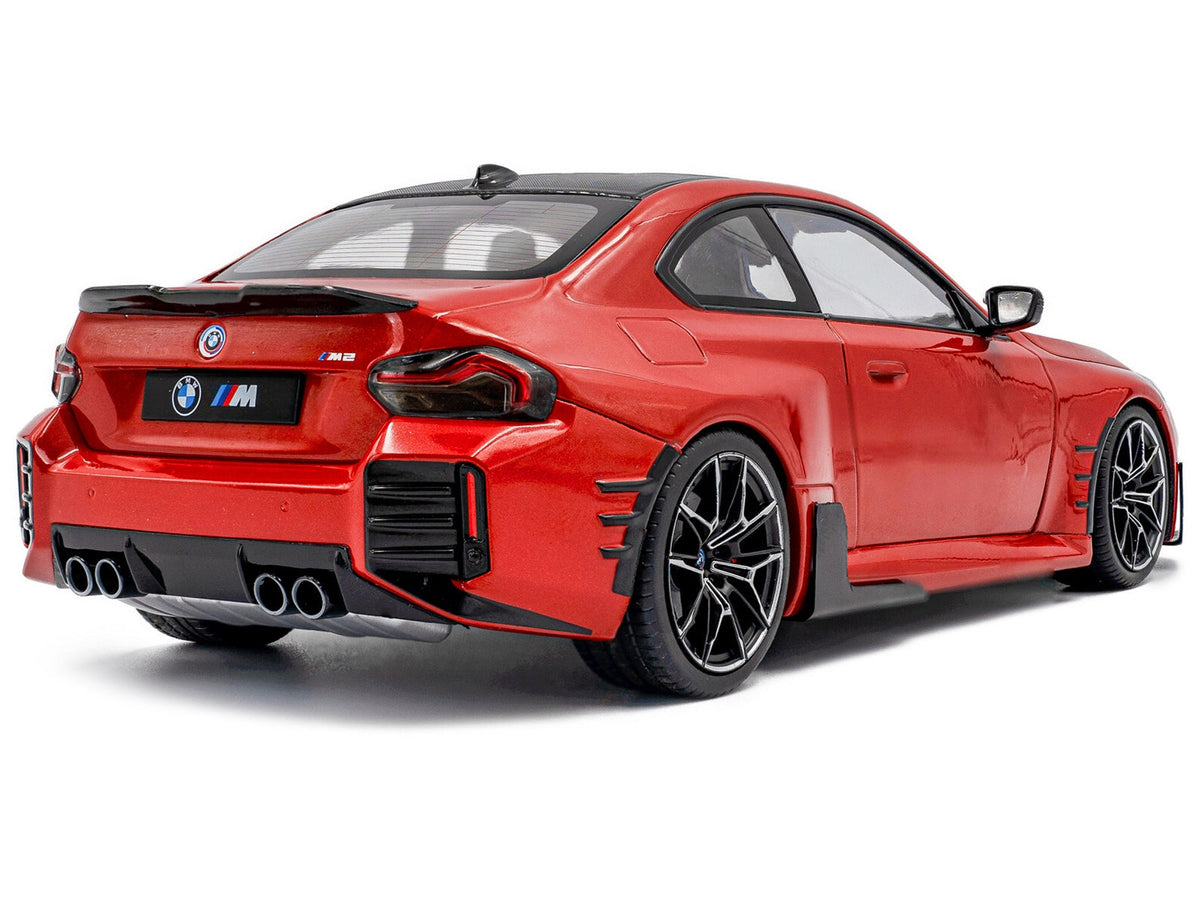 2024 BMW M2 diecast model car in Toronto Red Metallic with carbon top, detailed Miniature Motors 1/18 scale by Solido
