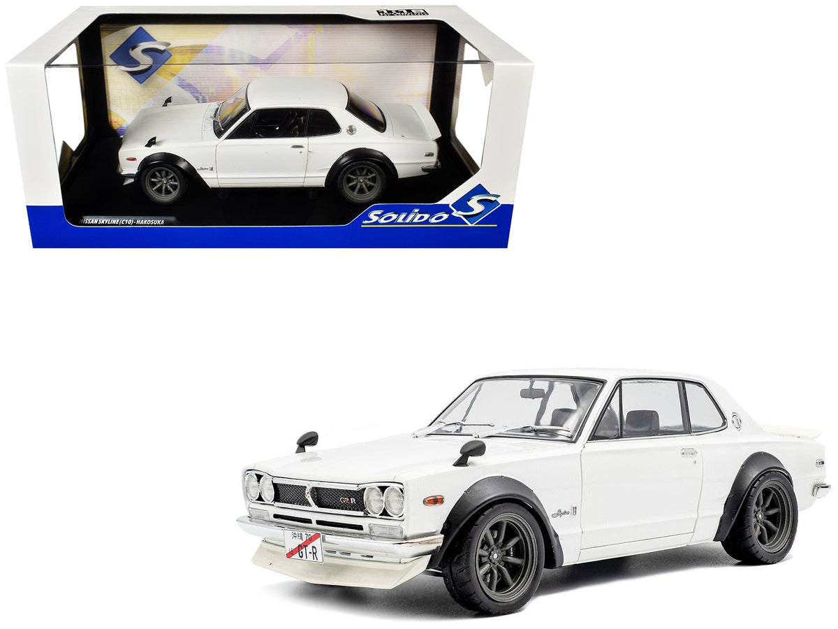 White 1/18 diecast Nissan Skyline C10 Hakosuka model car by Miniature Motors, detailed RHD Nissan model from 1970.